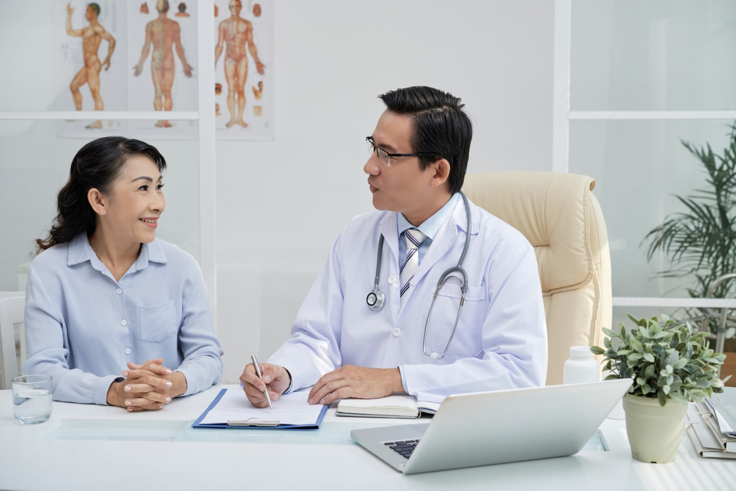 Doctor discussing treatment options with patients