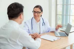 Doctor providing aesthetic treatment consultation to patient