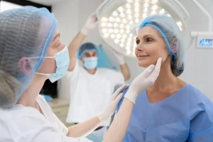 Surgeon examining patient before surgery