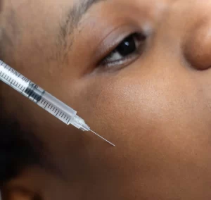 Injection applied to patient’s face
